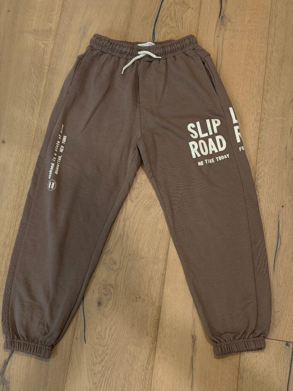Zara Boys Brown Sweatpants with "Slip Road" Graphic